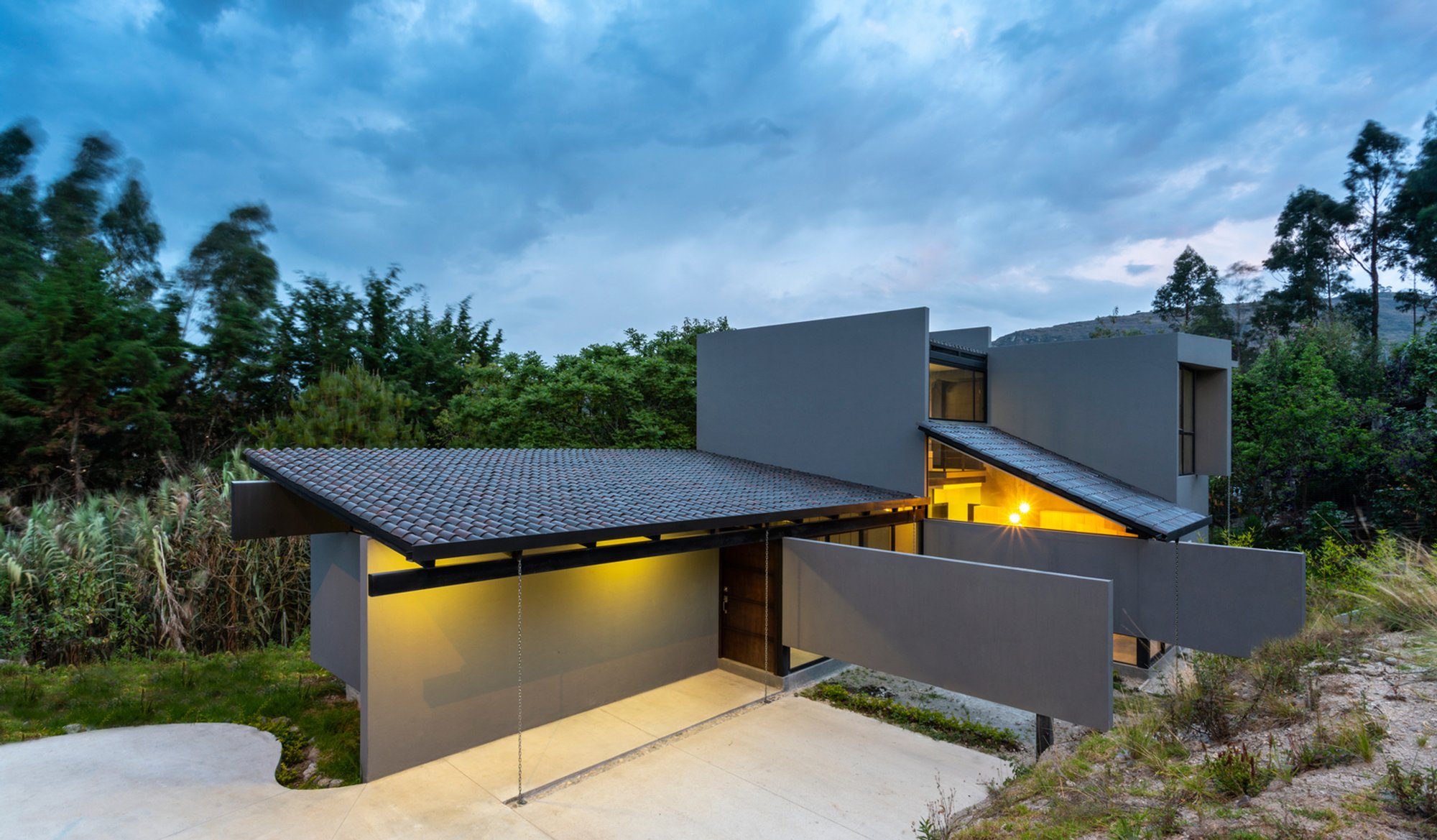 Unveiling the architectural marvel of House Branches and Rocks by Ruptura Morlaca Arquitectura in Nulti Mountain.