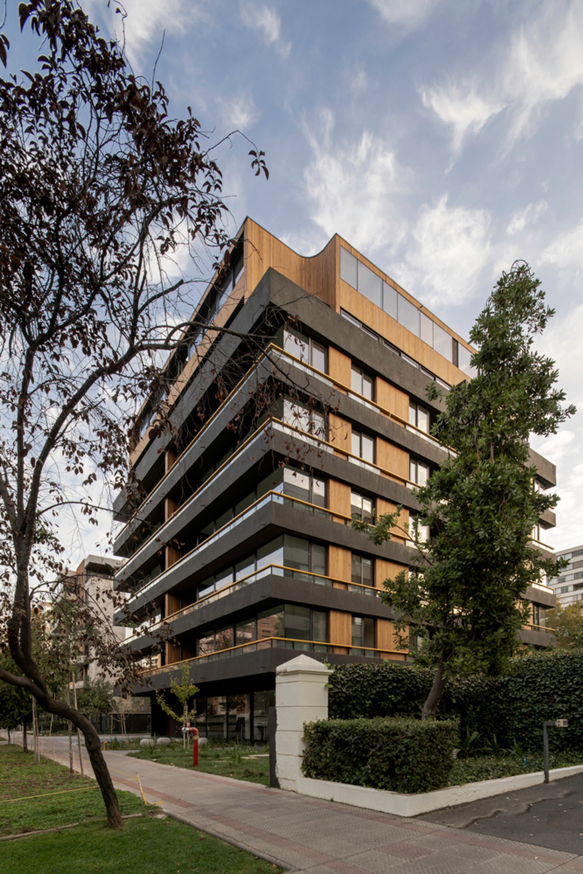 Modern Medium-Density Housing in Providencia: JS449 Apartment Building by Duque Motta & AA + FIA