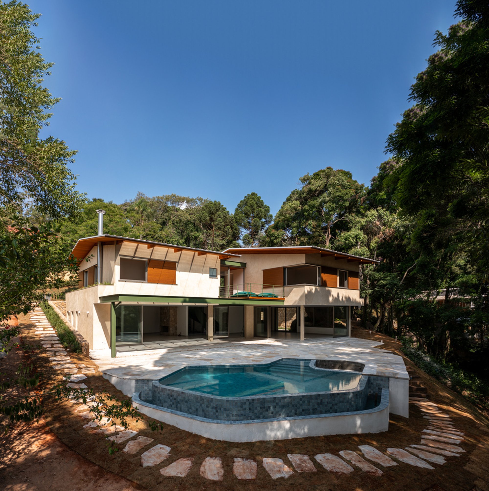 House with a Rock: Blending Architecture with Nature in Ibiúna, Brazil