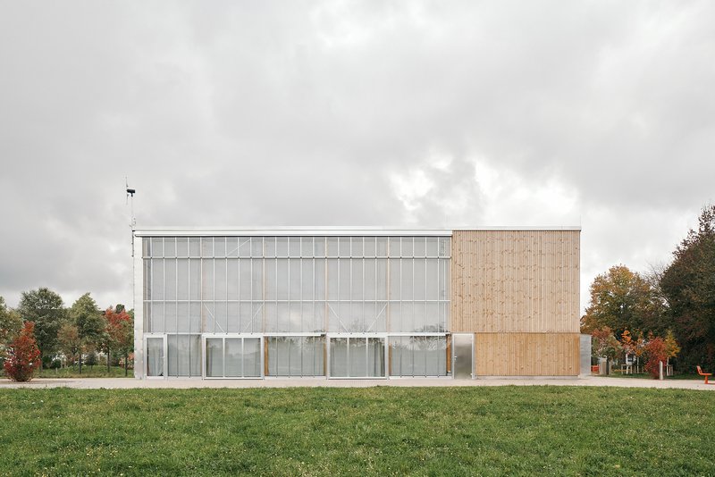 Repeat of the long elevation under cloudy daylight