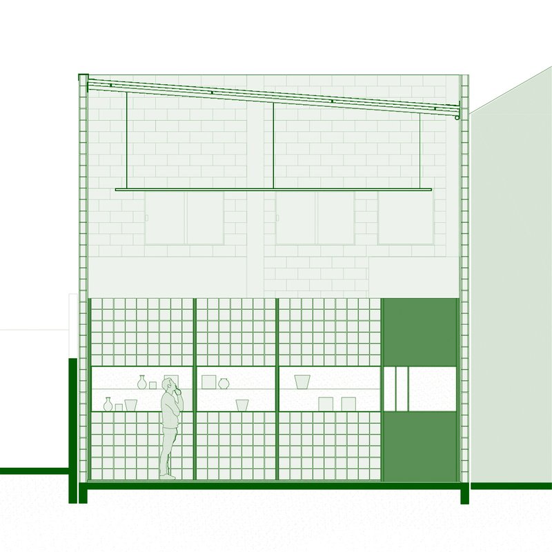Section drawing depicting the glass block facade with shelving and figure at ground level