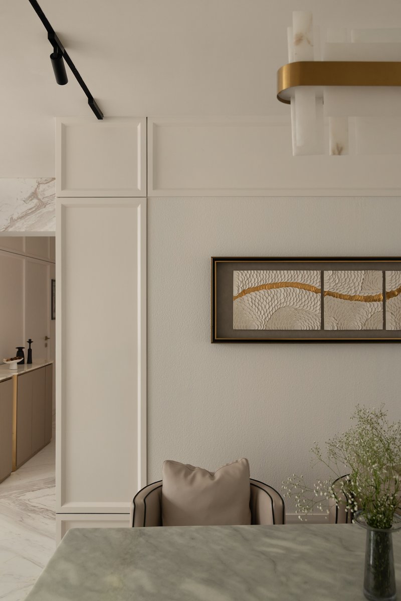 A detail of the dining wall art and panelled millwork.