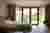 This image showcases a bright and airy hospital room designed for patient comfort and healing. The r
