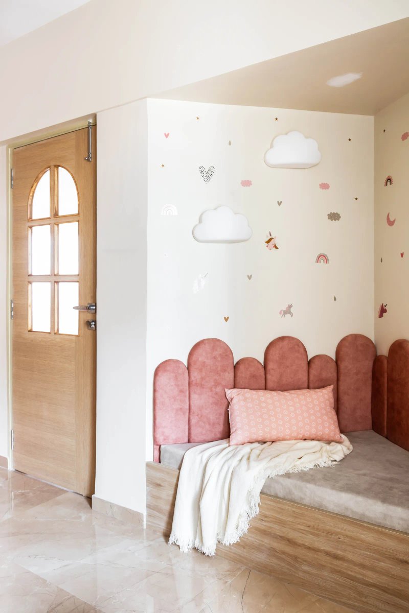 A pastel peachy pink teamed with birch wood adds playfulness to the kid’s room. Anuja Kambli