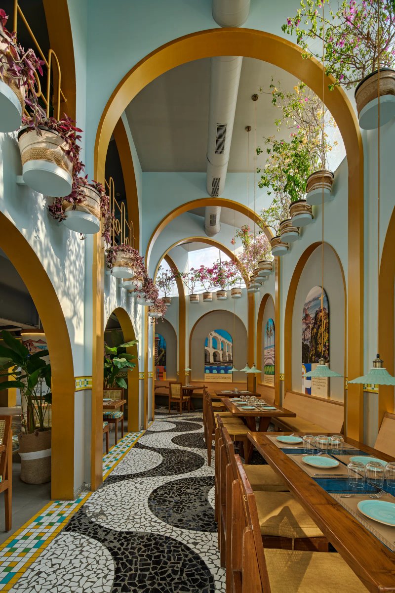 Arches are a key design element of the restaurant, a feature inspired by Rio de Janeiro's Carioca Aqueduct that's colloquially known as the Arcos da Lapa (Lapa Arches). Shamanth Patil