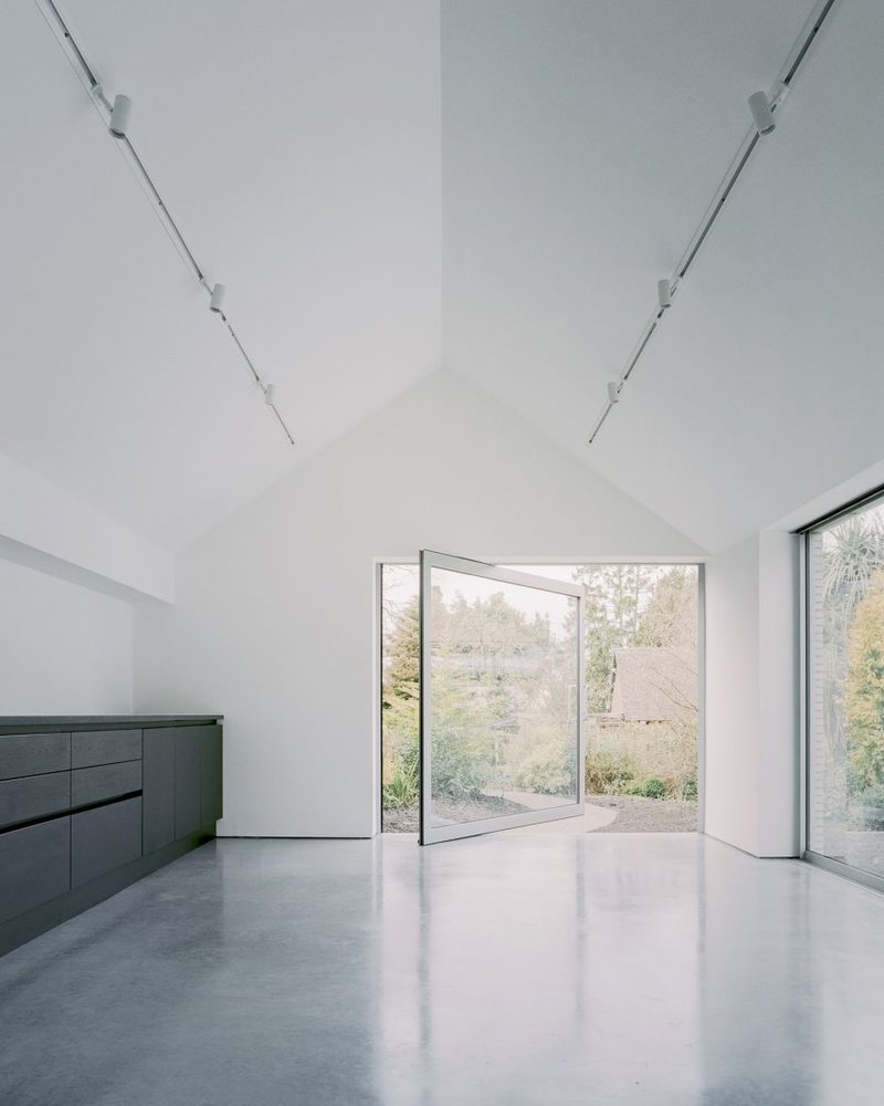 Over the edge pivoting doors