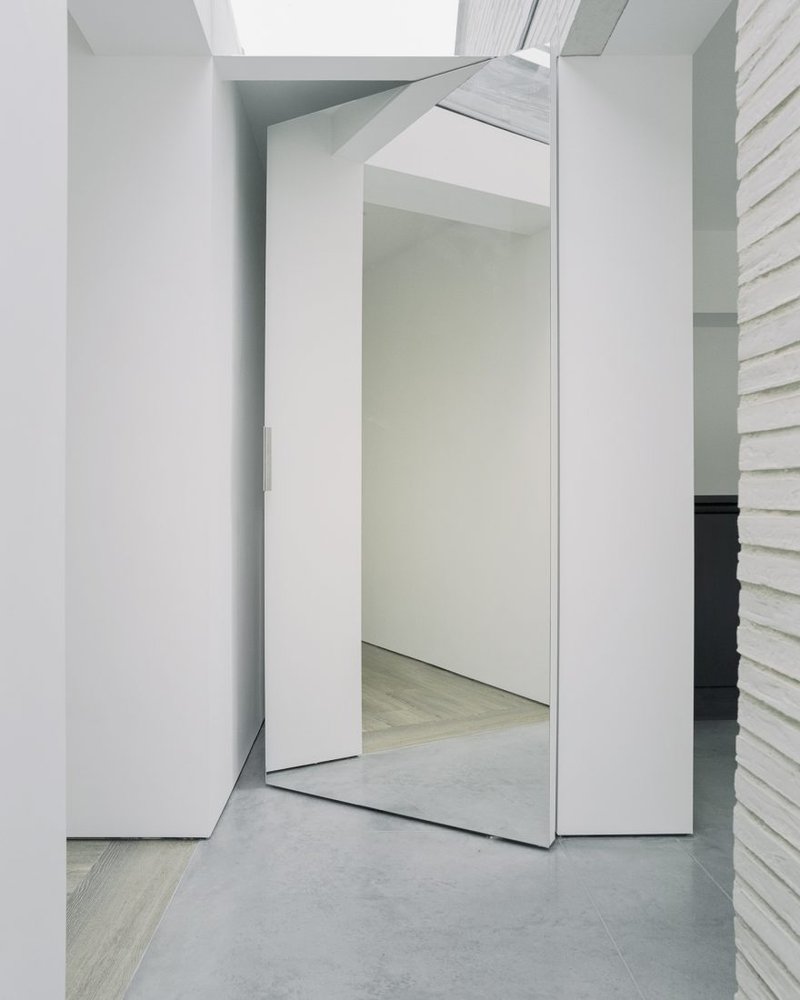 Over the edge pivoting doors