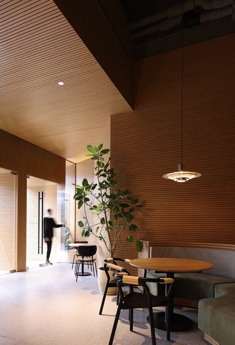 Viewing the entrance along the street from the interior © Xiaole