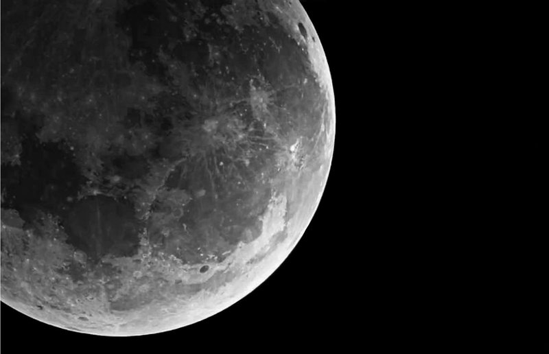 Lunar Gaze: Craters Whispering Celestial Secrets.