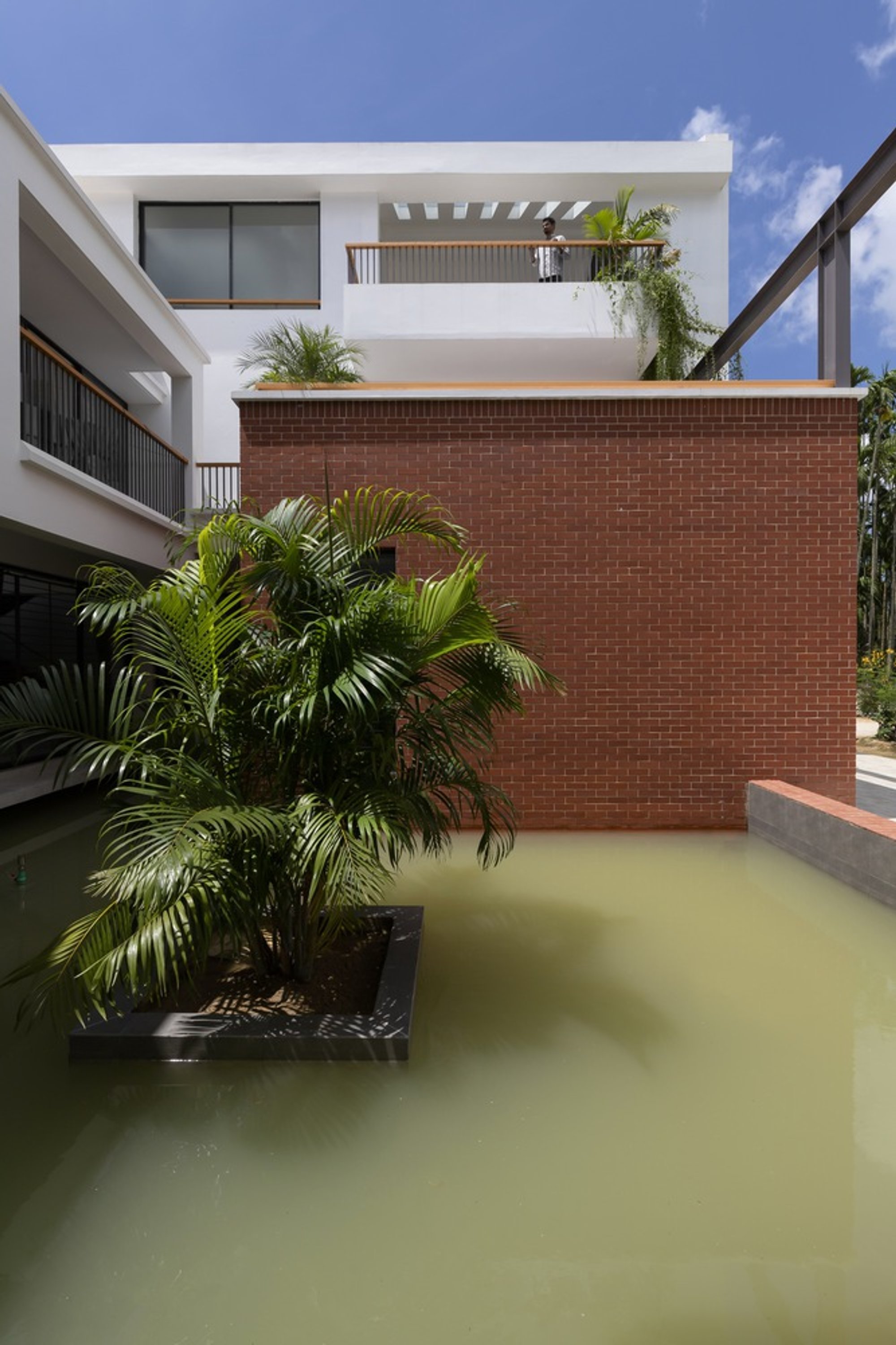 3 Points Consultant Builds a House Around a Water Court Near the Bay of Bengal