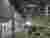 This architectural image showcases the interior of a large industrial warehouse or factory. The spac
