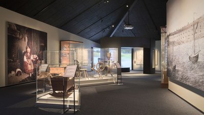 This image showcases the interior of a museum, featuring various display cases containing historical