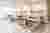 This image showcases a modern hospital room with multiple patient beds. The room features a clean an